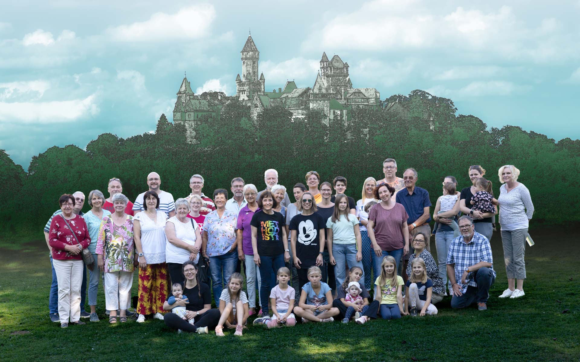 Gruppenfoto vor einer Schlosskulisse